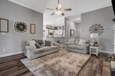 Nestled in a beautifully landscaped, gated community, this on Heritage Lakes - Par 3 - 9 Hole Course in Texas - for sale on GolfHomes.com, golf home, golf lot