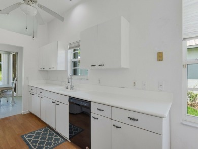Invest in Location with this Lakefront property overlooking the on Meadowood Golf and Tennis Club in Florida - for sale on GolfHomes.com, golf home, golf lot