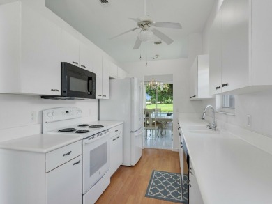 Invest in Location with this Lakefront property overlooking the on Meadowood Golf and Tennis Club in Florida - for sale on GolfHomes.com, golf home, golf lot