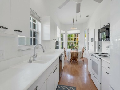 Invest in Location with this Lakefront property overlooking the on Meadowood Golf and Tennis Club in Florida - for sale on GolfHomes.com, golf home, golf lot