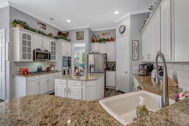 Nestled in a beautifully landscaped, gated community, this on Heritage Lakes - Par 3 - 9 Hole Course in Texas - for sale on GolfHomes.com, golf home, golf lot