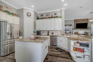 Nestled in a beautifully landscaped, gated community, this on Heritage Lakes - Par 3 - 9 Hole Course in Texas - for sale on GolfHomes.com, golf home, golf lot