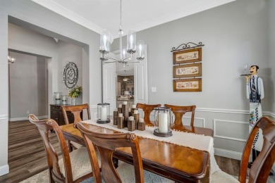 Nestled in a beautifully landscaped, gated community, this on Heritage Lakes - Par 3 - 9 Hole Course in Texas - for sale on GolfHomes.com, golf home, golf lot