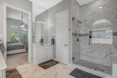 Nestled in a beautifully landscaped, gated community, this on Heritage Lakes - Par 3 - 9 Hole Course in Texas - for sale on GolfHomes.com, golf home, golf lot
