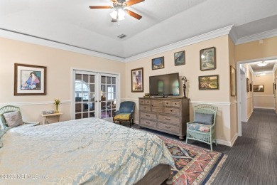 Experience luxury & tranquility in this stunning single-story on Magnolia Point Golf and Country Club in Florida - for sale on GolfHomes.com, golf home, golf lot