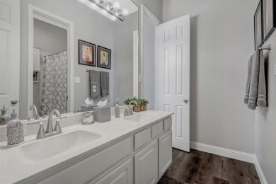 Nestled in a beautifully landscaped, gated community, this on Heritage Lakes - Par 3 - 9 Hole Course in Texas - for sale on GolfHomes.com, golf home, golf lot