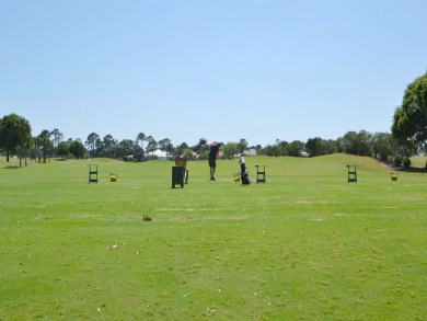 Invest in Location with this Lakefront property overlooking the on Meadowood Golf and Tennis Club in Florida - for sale on GolfHomes.com, golf home, golf lot