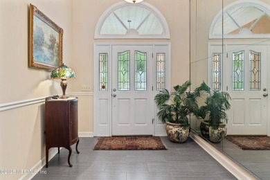 Experience luxury & tranquility in this stunning single-story on Magnolia Point Golf and Country Club in Florida - for sale on GolfHomes.com, golf home, golf lot