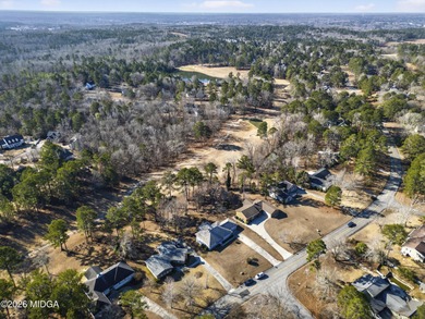 Beautiful all-brick home on the 2nd fairway! This 3-bedroom on Canongate At Healy Point Country Club in Georgia - for sale on GolfHomes.com, golf home, golf lot
