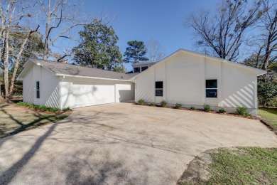 This home has been totally renovated and is located on the #7 on Diamondhead Country Club in Mississippi - for sale on GolfHomes.com, golf home, golf lot