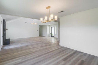 This home has been totally renovated and is located on the #7 on Diamondhead Country Club in Mississippi - for sale on GolfHomes.com, golf home, golf lot