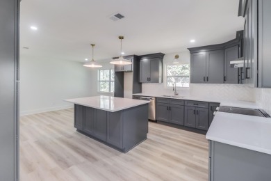 This home has been totally renovated and is located on the #7 on Diamondhead Country Club in Mississippi - for sale on GolfHomes.com, golf home, golf lot