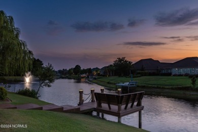 Experience luxury coastal living in the serene community of on Compass Pointe Golf Course in North Carolina - for sale on GolfHomes.com, golf home, golf lot