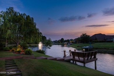 Experience luxury coastal living in the serene community of on Compass Pointe Golf Course in North Carolina - for sale on GolfHomes.com, golf home, golf lot