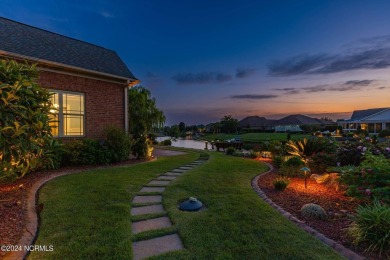 Experience luxury coastal living in the serene community of on Compass Pointe Golf Course in North Carolina - for sale on GolfHomes.com, golf home, golf lot