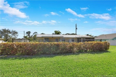 Entire Duplex for sale each unit is 2 bedrooms 1 bathroom, with on Martin County Golf Course in Florida - for sale on GolfHomes.com, golf home, golf lot