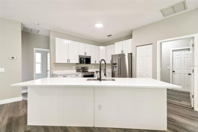 Completely renovated 4-bedroom 3-bathroom home located in on Heritage Harbor Golf and Country Club in Florida - for sale on GolfHomes.com, golf home, golf lot