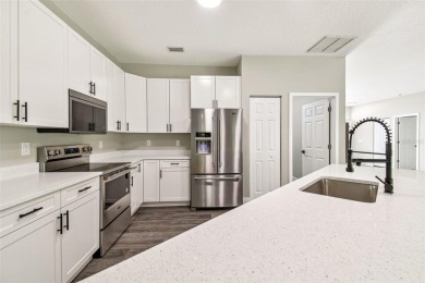 Completely renovated 4-bedroom 3-bathroom home located in on Heritage Harbor Golf and Country Club in Florida - for sale on GolfHomes.com, golf home, golf lot