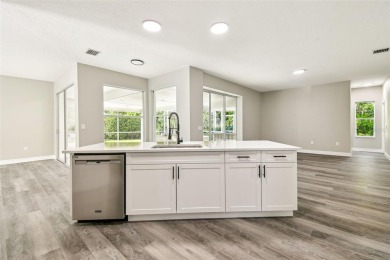 Completely renovated 4-bedroom 3-bathroom home located in on Heritage Harbor Golf and Country Club in Florida - for sale on GolfHomes.com, golf home, golf lot