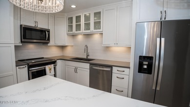 Fully Renovated Waterfront Condo - Harbor Villas Wake up to on Bay Point Resort Golf Club in Florida - for sale on GolfHomes.com, golf home, golf lot