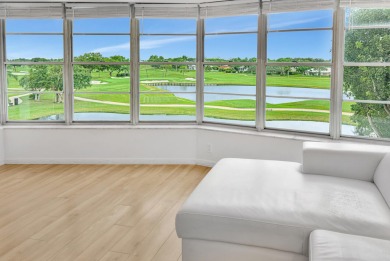 Stunning Coral Ridge Golf Course views from every room of this on Coral Ridge Country Club in Florida - for sale on GolfHomes.com, golf home, golf lot
