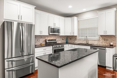 Beautifully maintained, move-in ready home featuring neutral on Carillon Lakes 3 Hole Course in Illinois - for sale on GolfHomes.com, golf home, golf lot