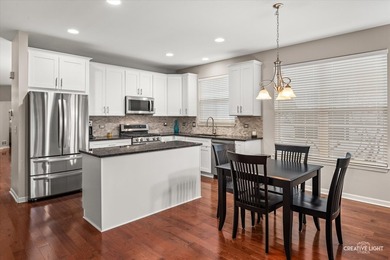 Beautifully maintained, move-in ready home featuring neutral on Carillon Lakes 3 Hole Course in Illinois - for sale on GolfHomes.com, golf home, golf lot