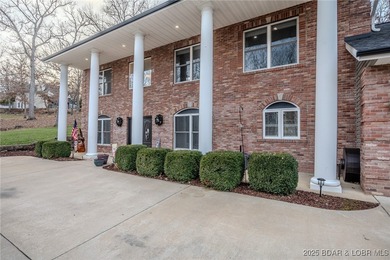 Spacious and stylish 2-story home in Horseshoe Bend on over 1 on Seasons Ridge At Four Seasons in Missouri - for sale on GolfHomes.com, golf home, golf lot