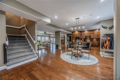 Spacious and stylish 2-story home in Horseshoe Bend on over 1 on Seasons Ridge At Four Seasons in Missouri - for sale on GolfHomes.com, golf home, golf lot