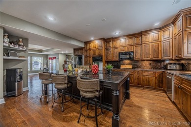 Spacious and stylish 2-story home in Horseshoe Bend on over 1 on Seasons Ridge At Four Seasons in Missouri - for sale on GolfHomes.com, golf home, golf lot