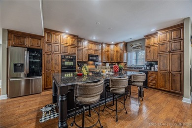 Spacious and stylish 2-story home in Horseshoe Bend on over 1 on Seasons Ridge At Four Seasons in Missouri - for sale on GolfHomes.com, golf home, golf lot