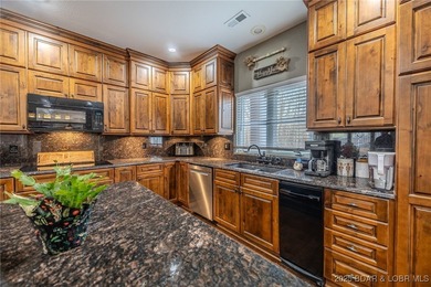 Spacious and stylish 2-story home in Horseshoe Bend on over 1 on Seasons Ridge At Four Seasons in Missouri - for sale on GolfHomes.com, golf home, golf lot