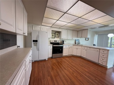 Priced to sell and in need of TLC unusually large condominium on East Bay Golf Club in Florida - for sale on GolfHomes.com, golf home, golf lot