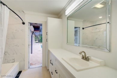 Welcome to 16597 Bear Cub Court, a stunning custom-designed home on The Forest Country Club in Florida - for sale on GolfHomes.com, golf home, golf lot