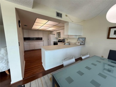 Priced to sell and in need of TLC unusually large condominium on East Bay Golf Club in Florida - for sale on GolfHomes.com, golf home, golf lot