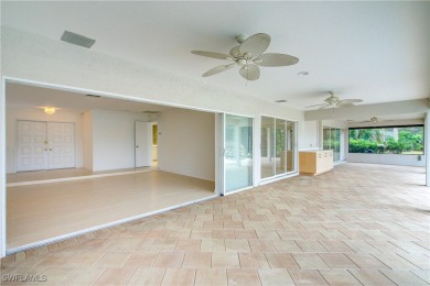 Welcome to 16597 Bear Cub Court, a stunning custom-designed home on The Forest Country Club in Florida - for sale on GolfHomes.com, golf home, golf lot