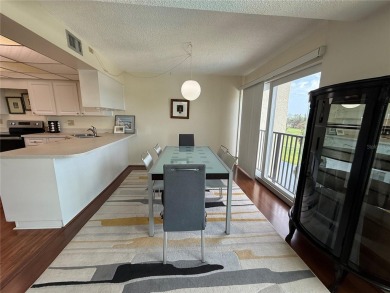 Priced to sell and in need of TLC unusually large condominium on East Bay Golf Club in Florida - for sale on GolfHomes.com, golf home, golf lot