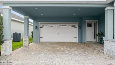 This exquisite pool home is ideally located on a lush golf on Venetian Bay Golf Course in Florida - for sale on GolfHomes.com, golf home, golf lot