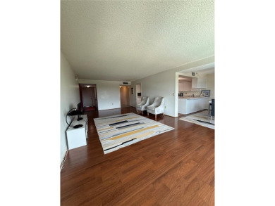 Priced to sell and in need of TLC unusually large condominium on East Bay Golf Club in Florida - for sale on GolfHomes.com, golf home, golf lot