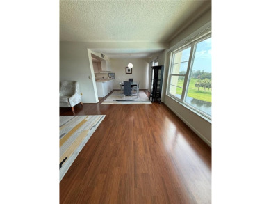 Priced to sell and in need of TLC unusually large condominium on East Bay Golf Club in Florida - for sale on GolfHomes.com, golf home, golf lot