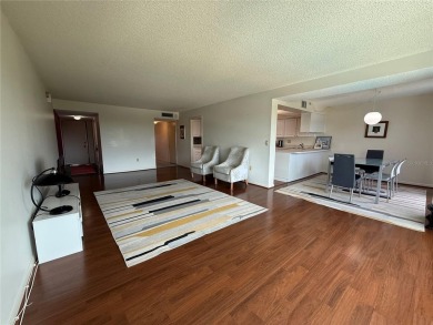 Priced to sell and in need of TLC unusually large condominium on East Bay Golf Club in Florida - for sale on GolfHomes.com, golf home, golf lot
