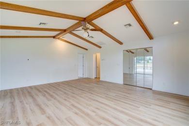 Welcome to 16597 Bear Cub Court, a stunning custom-designed home on The Forest Country Club in Florida - for sale on GolfHomes.com, golf home, golf lot