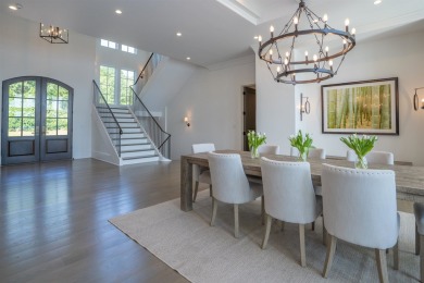 EXCEPTIONAL LAKEFRONT RESIDENCE WITH BREATHTAKING VIEWS FROM on The Golf Club at Cuscowilla in Georgia - for sale on GolfHomes.com, golf home, golf lot