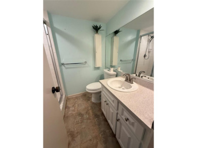 Priced to sell and in need of TLC unusually large condominium on East Bay Golf Club in Florida - for sale on GolfHomes.com, golf home, golf lot