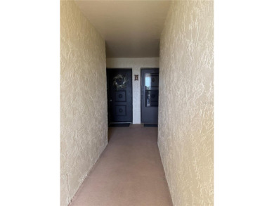 Priced to sell and in need of TLC unusually large condominium on East Bay Golf Club in Florida - for sale on GolfHomes.com, golf home, golf lot