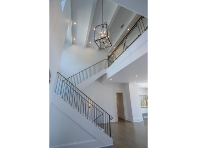 EXCEPTIONAL LAKEFRONT RESIDENCE WITH BREATHTAKING VIEWS FROM on The Golf Club at Cuscowilla in Georgia - for sale on GolfHomes.com, golf home, golf lot