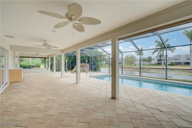 Welcome to 16597 Bear Cub Court, a stunning custom-designed home on The Forest Country Club in Florida - for sale on GolfHomes.com, golf home, golf lot