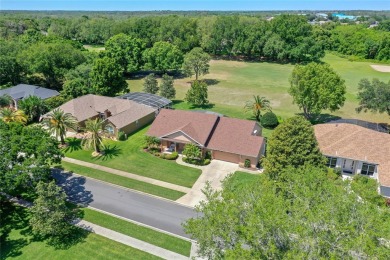 Welcome to this charming golf course home nestled on a vast lot on Green Valley Country Club in Florida - for sale on GolfHomes.com, golf home, golf lot