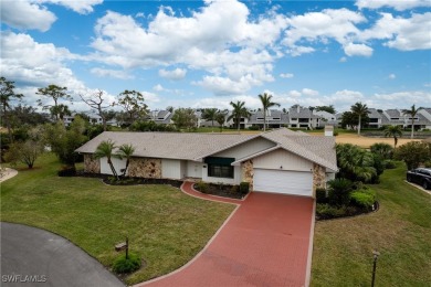 Welcome to 16597 Bear Cub Court, a stunning custom-designed home on The Forest Country Club in Florida - for sale on GolfHomes.com, golf home, golf lot