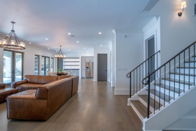 EXCEPTIONAL LAKEFRONT RESIDENCE WITH BREATHTAKING VIEWS FROM on The Golf Club at Cuscowilla in Georgia - for sale on GolfHomes.com, golf home, golf lot